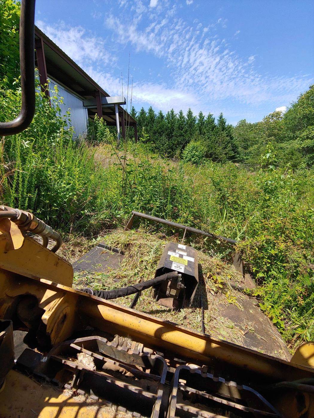 Overgrown brush cleared for vegetation control in Greenville, SC