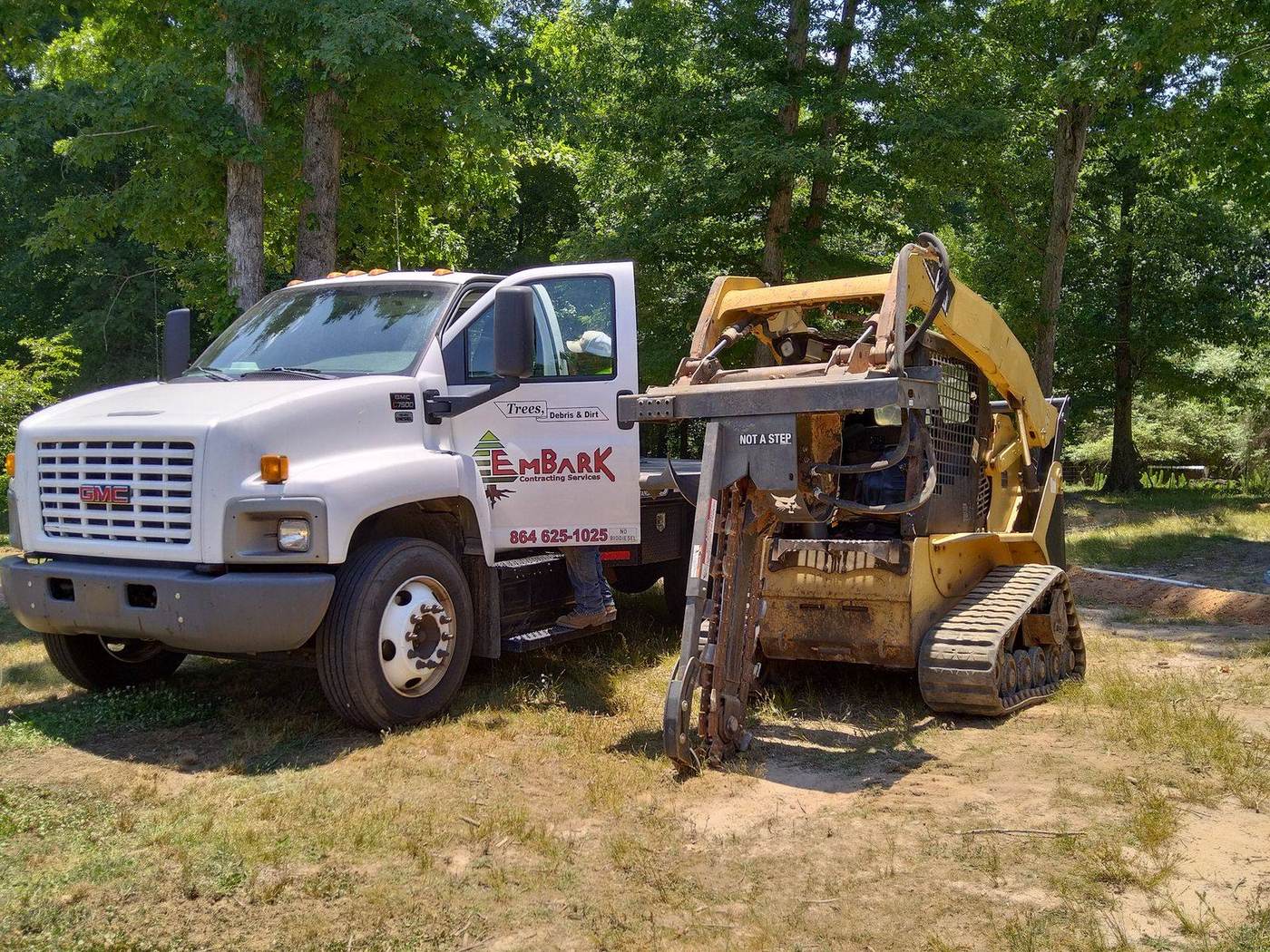 Embark loader moving material on a Marietta job site