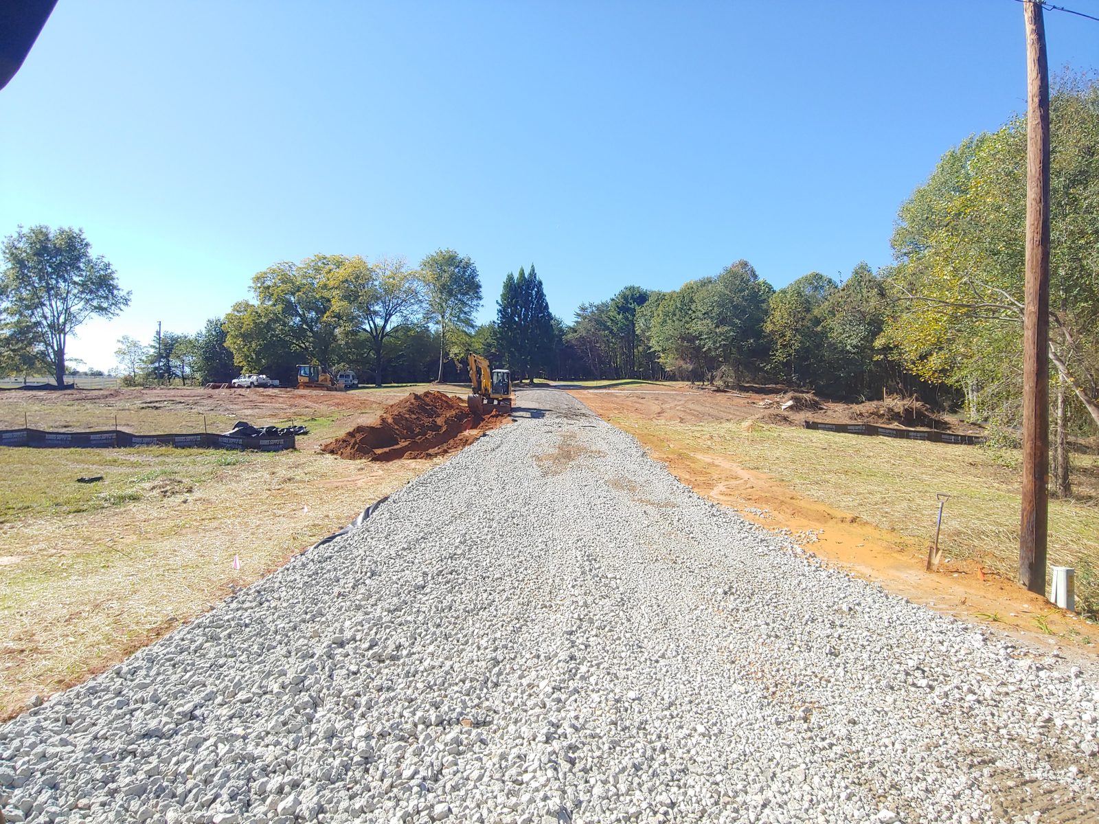 Gravel driveway installation on a cleared Easley, SC property