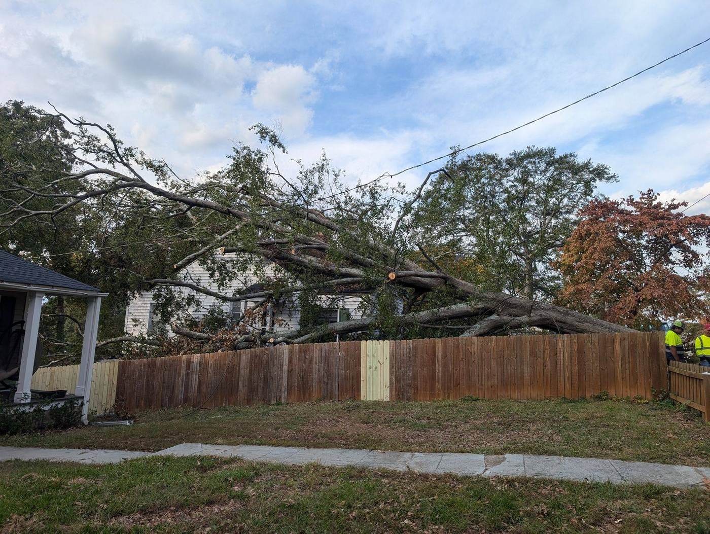 Large oak removed from a home after a storm
